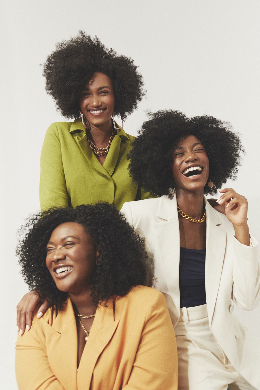 Three women laughing together, RadSwan campaign