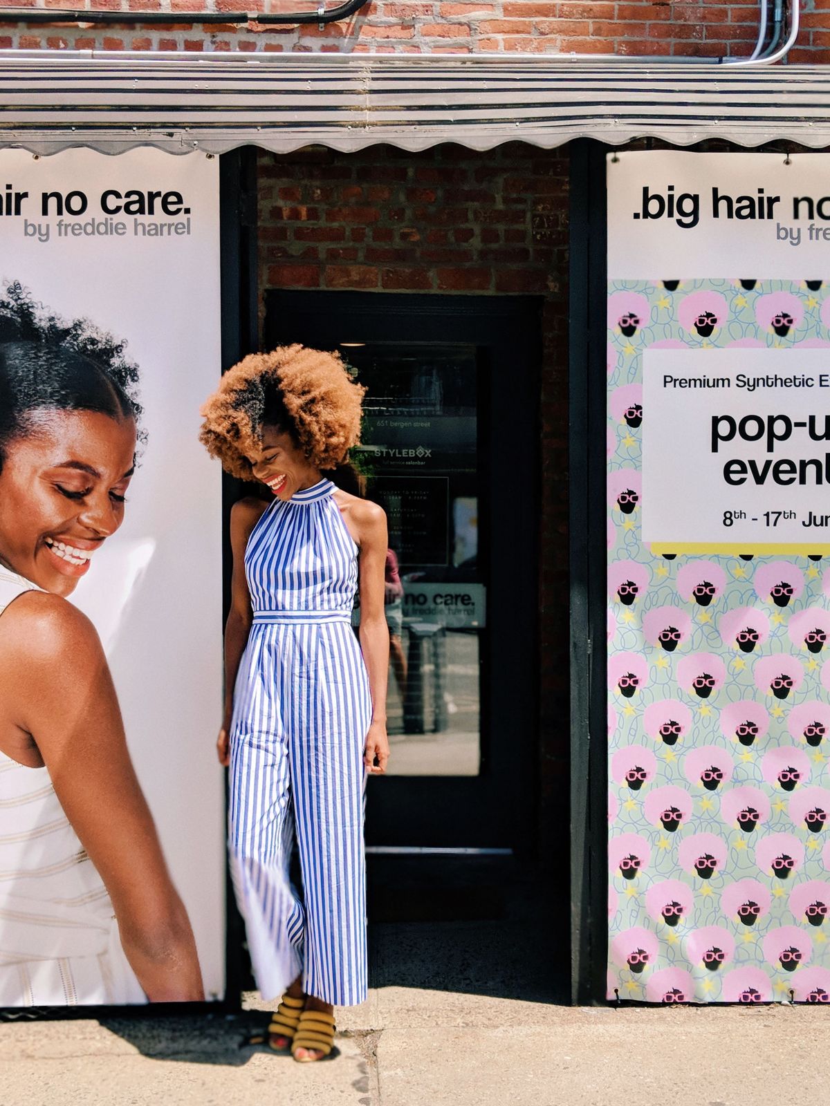 Freddie outside a Big Hair No Care pop-up store