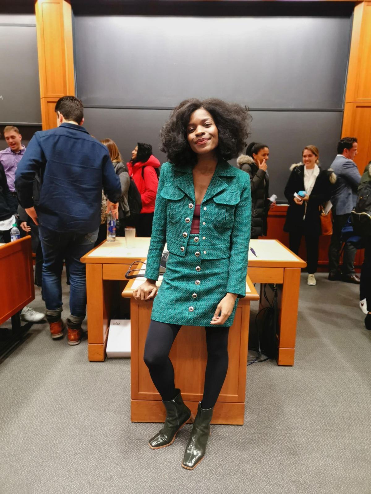 Freddie in a green suit at Harvard Business School